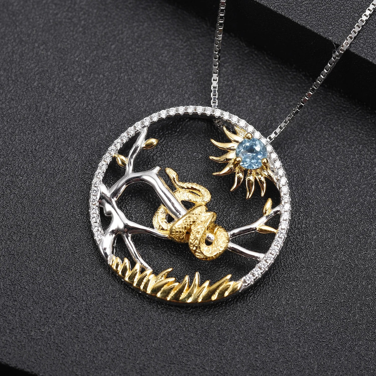 The Shed Skin — Swiss Blue Topaz Snake Zodiac Necklace