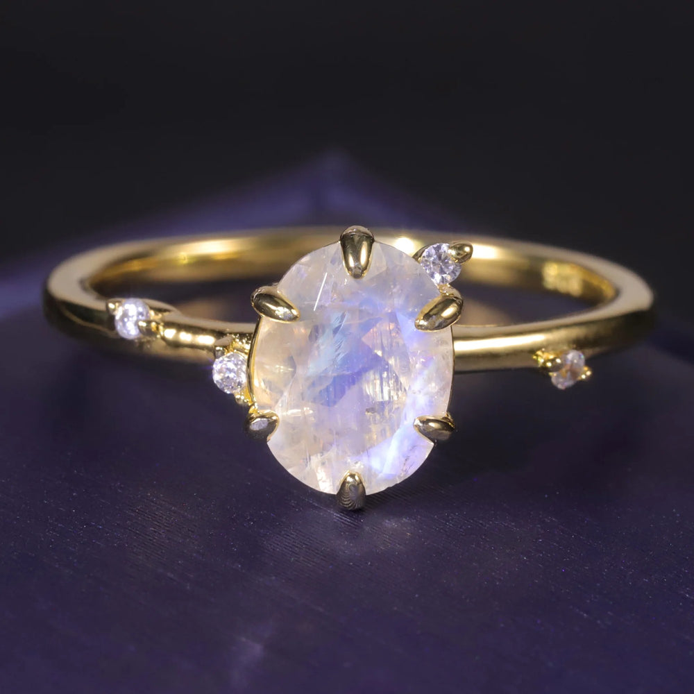 Oval moonstone ring on a fine gold-tone band