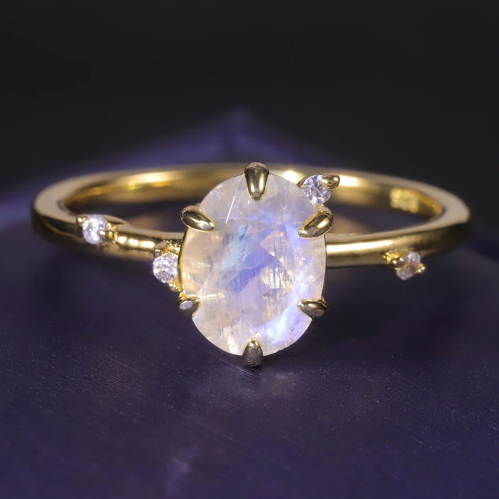 Oval moonstone ring on a fine gold-tone band