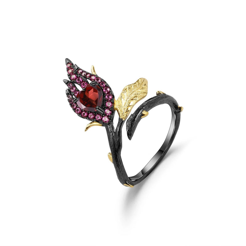 Garnet heart ring on a blackened branch band