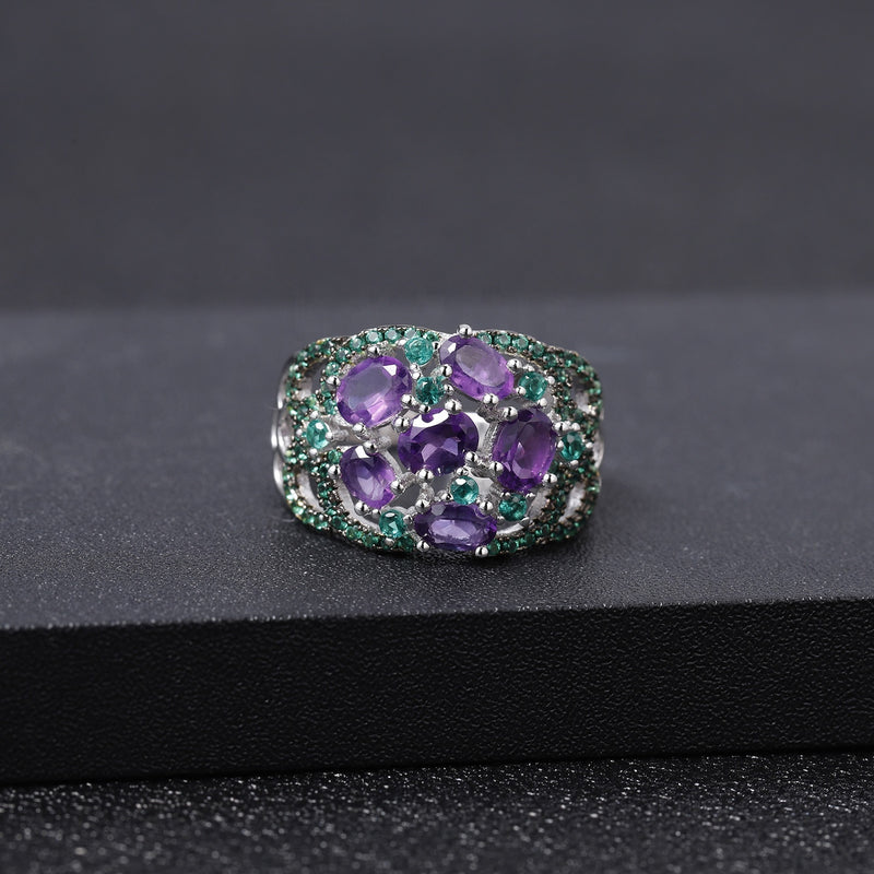 Amethyst ring with green accent stones in sterling silver